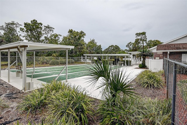8913 Welsh Way, Hudson, FL 34667 - surrounding community featuring fence and shuffleboard