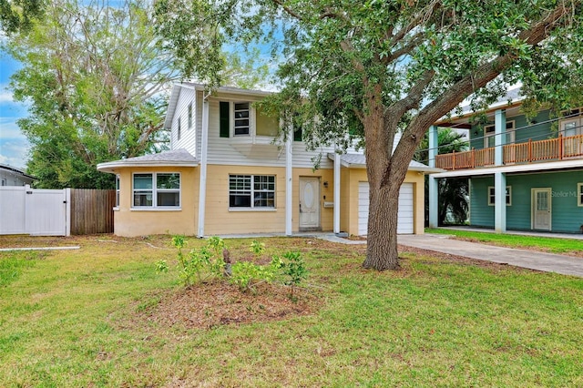 1810 Maryland Ave NE, Saint Petersburg, FL 33703 - view of front facade with a garage, driveway, and a gate