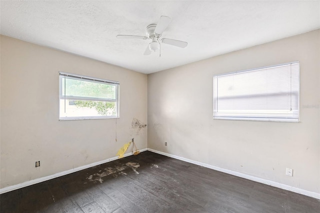 1810 Maryland Ave NE, Saint Petersburg, FL 33703 - unfurnished room featuring hardwood / wood-style floors, baseboards, and ceiling fan