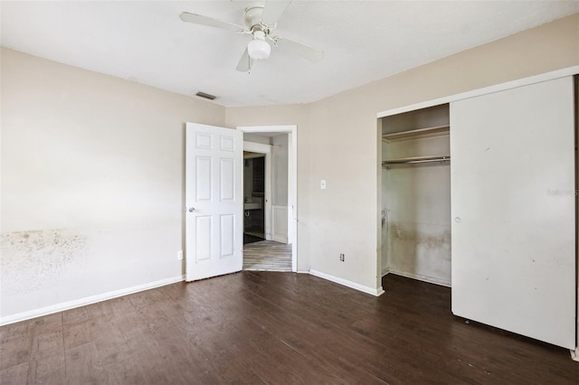 1810 Maryland Ave NE, Saint Petersburg, FL 33703 - unfurnished bedroom featuring wood finished floors, baseboards, a closet, and ceiling fan