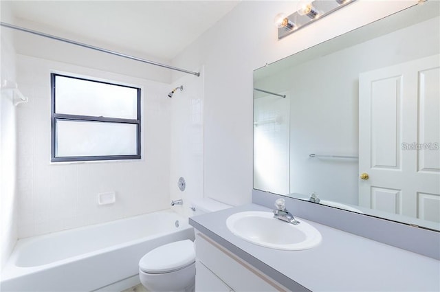 9220 Dayflower Dr, Tampa, FL 33647 - bathroom with vanity, toilet, and bathtub / shower combination
