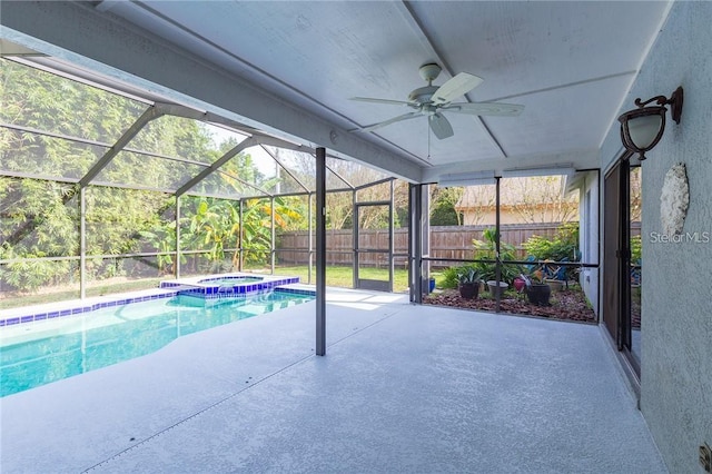9220 Dayflower Dr, Tampa, FL 33647 - view of swimming pool featuring a patio, ceiling fan, a fenced backyard, a pool with connected hot tub, and a lanai