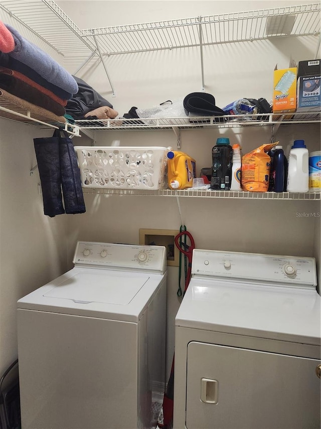 9220 Dayflower Dr, Tampa, FL 33647 - laundry room featuring washer and dryer