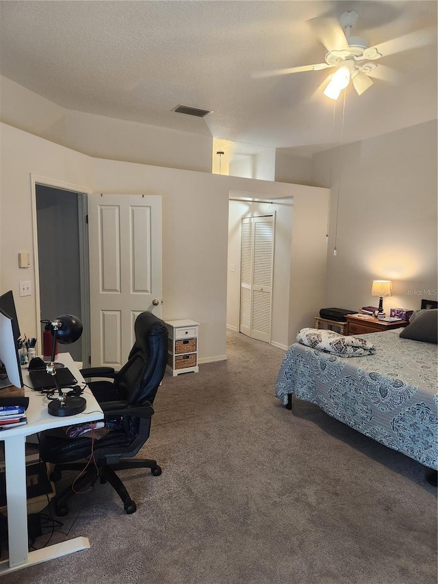 9220 Dayflower Dr, Tampa, FL 33647 - bedroom featuring a desk, carpet floors, a closet, and a ceiling fan