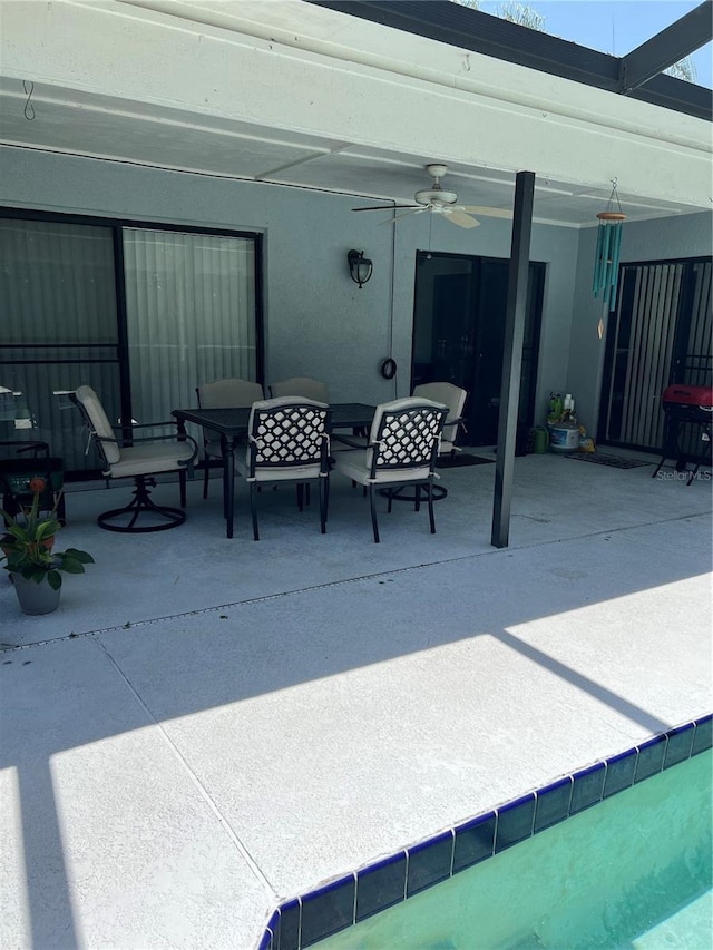 9220 Dayflower Dr, Tampa, FL 33647 - view of patio featuring ceiling fan and outdoor dining space