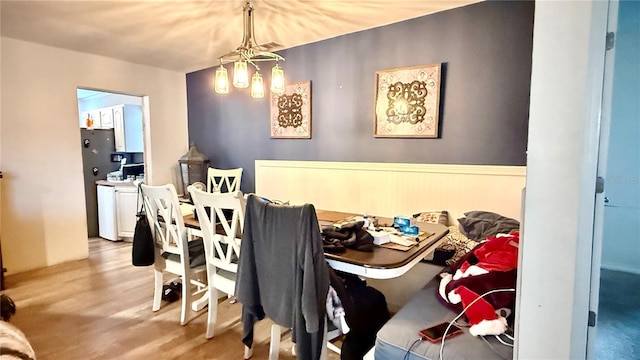 7012 Pin Cherry Ln, Port Richey, FL 34668 - dining area featuring wood finished floors