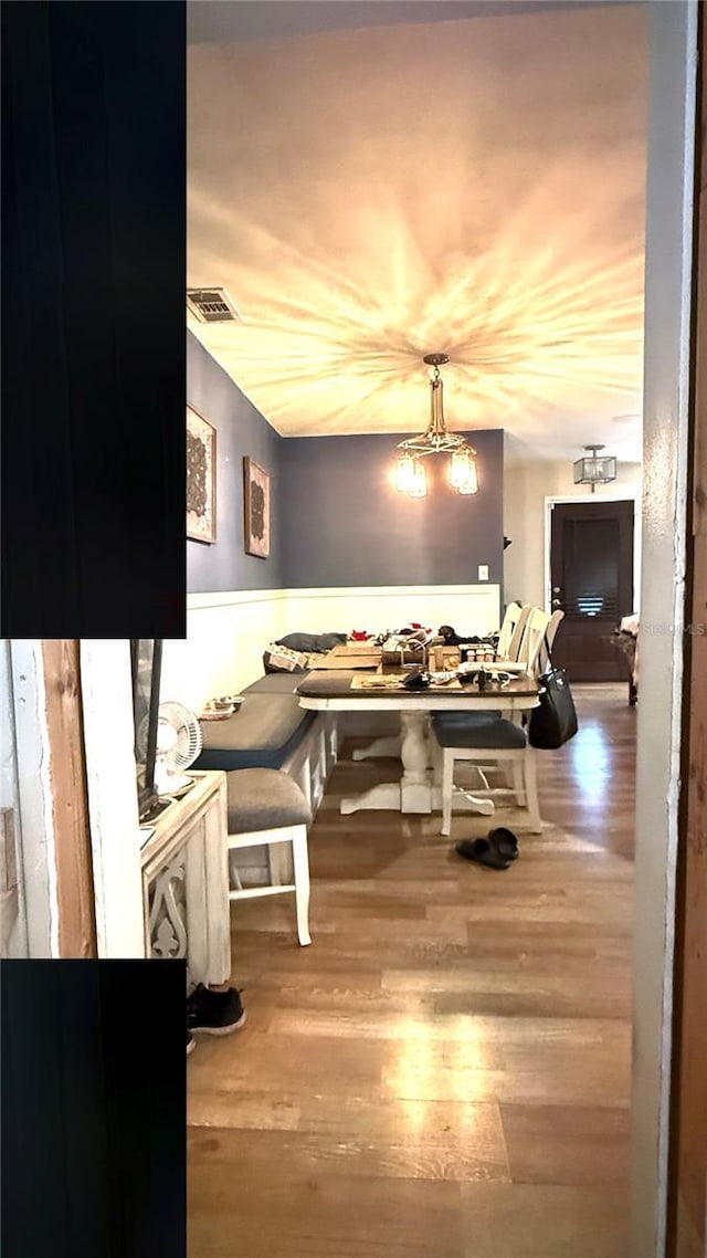 7012 Pin Cherry Ln, Port Richey, FL 34668 - dining room with wood finished floors