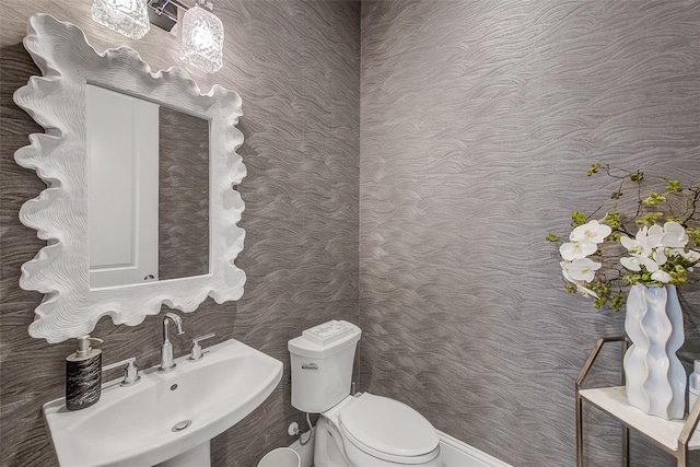 16707 Verona Pl, Bradenton, FL 34202 - half bathroom with a sink and wallpapered walls