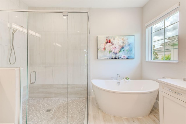 16707 Verona Pl, Bradenton, FL 34202 - full bathroom featuring a soaking tub, vanity, and a stall shower