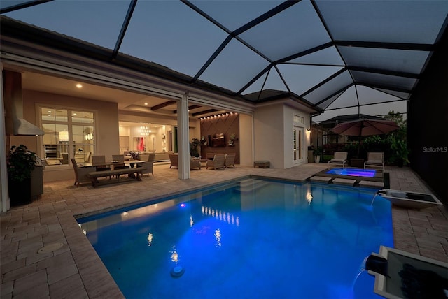 16707 Verona Pl, Bradenton, FL 34202 - outdoor pool with an in-ground hot tub, a patio area, and an outdoor hangout area