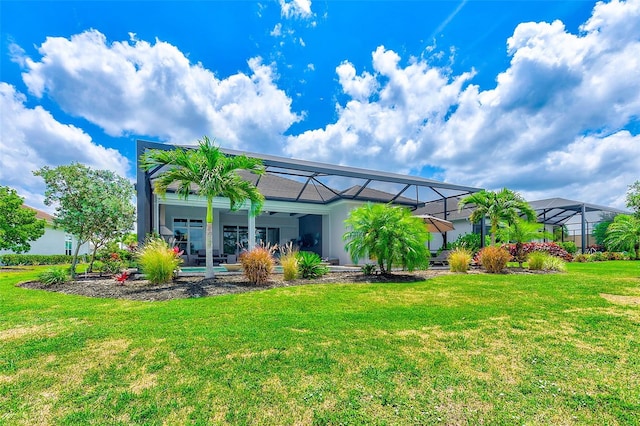 16707 Verona Pl, Bradenton, FL 34202 - back of property featuring a yard and a lanai