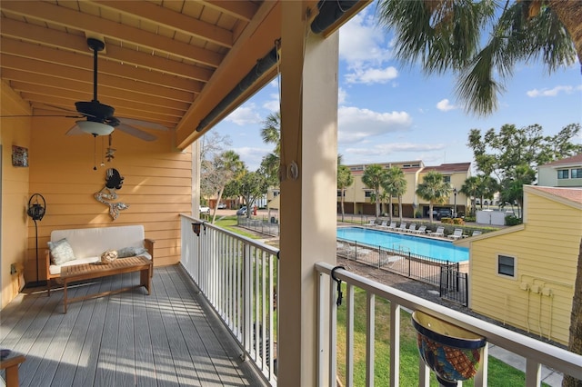 531 Sandy Hook Rd, Treasure Island, FL 33706 - balcony with view of pool and a ceiling fan
