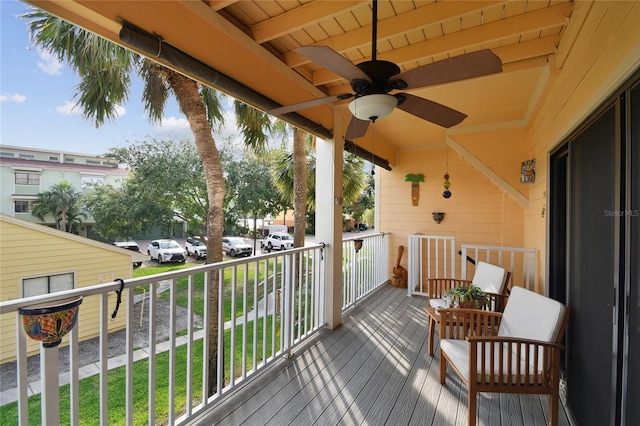 531 Sandy Hook Rd, Treasure Island, FL 33706 - deck featuring a ceiling fan and a yard