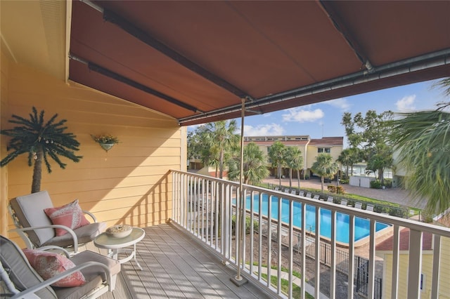 531 Sandy Hook Rd, Treasure Island, FL 33706 - balcony featuring view of pool