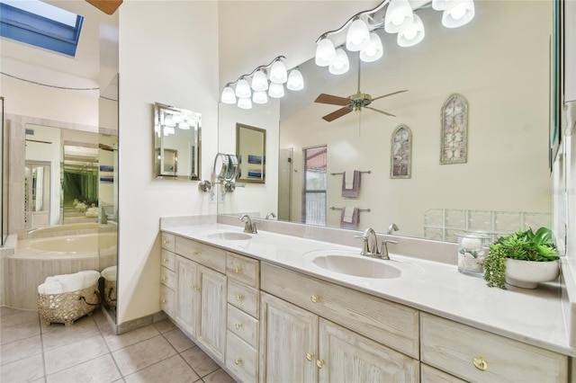 531 Sandy Hook Rd, Treasure Island, FL 33706 - bathroom with tile patterned floors, a bath, double vanity, a ceiling fan, and a high ceiling