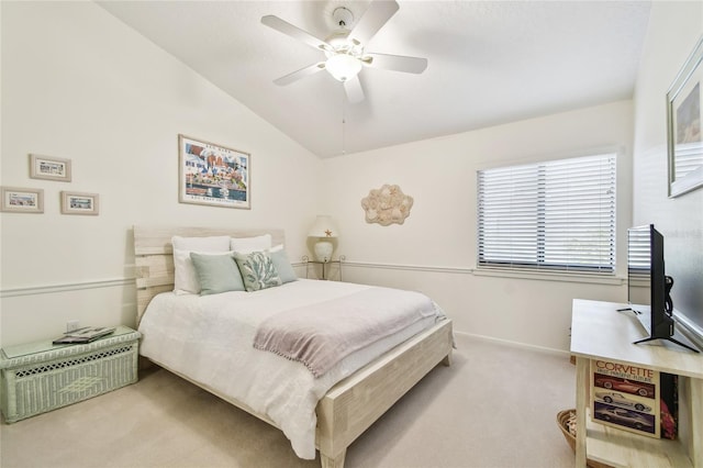 531 Sandy Hook Rd, Treasure Island, FL 33706 - carpeted bedroom featuring vaulted ceiling, baseboards, and a ceiling fan