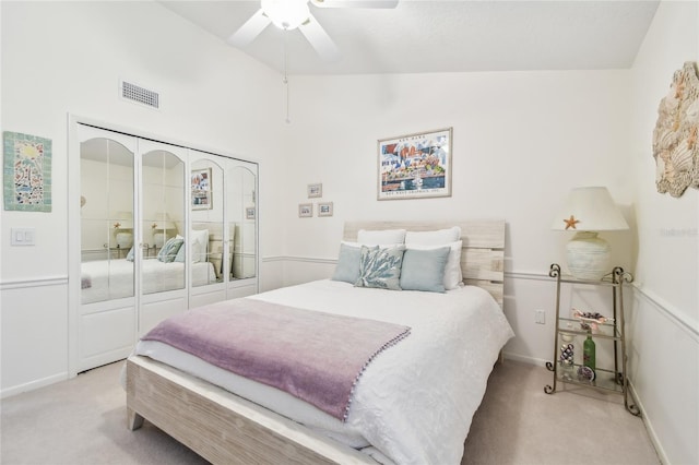 531 Sandy Hook Rd, Treasure Island, FL 33706 - bedroom featuring light colored carpet, lofted ceiling, baseboards, a closet, and ceiling fan