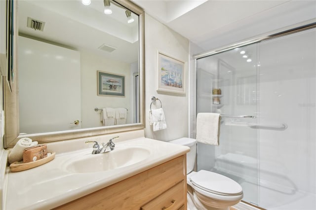 531 Sandy Hook Rd, Treasure Island, FL 33706 - full bathroom with a shower stall, toilet, and vanity