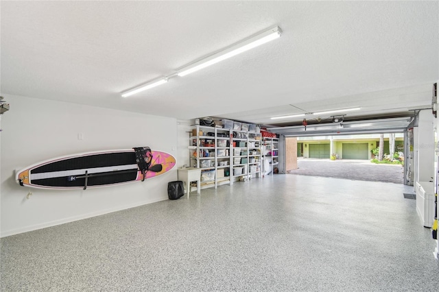 531 Sandy Hook Rd, Treasure Island, FL 33706 - garage with baseboards