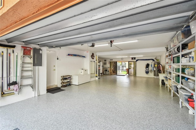 531 Sandy Hook Rd, Treasure Island, FL 33706 - garage with electric panel and a garage door opener