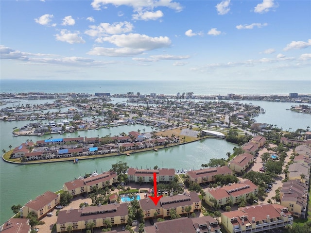 531 Sandy Hook Rd, Treasure Island, FL 33706 - aerial view of property and surrounding area featuring a large body of water and nearby suburban area