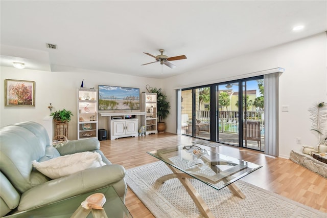 531 Sandy Hook Rd, Treasure Island, FL 33706 - living area featuring ceiling fan, light wood-type flooring, baseboards, and recessed lighting