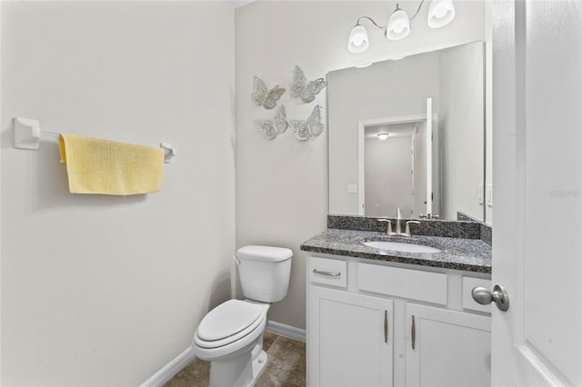 13233 Canopy Creek Dr, Tampa, FL 33625 - half bath featuring baseboards, toilet, and vanity