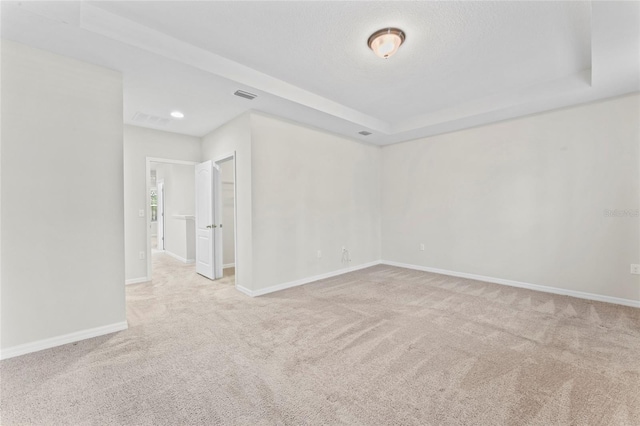13233 Canopy Creek Dr, Tampa, FL 33625 - unfurnished room with carpet, baseboards, recessed lighting, and a raised ceiling