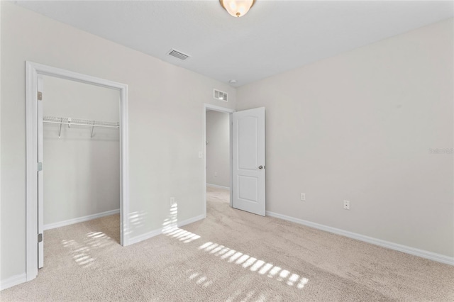 13233 Canopy Creek Dr, Tampa, FL 33625 - unfurnished bedroom featuring carpet, a closet, and baseboards