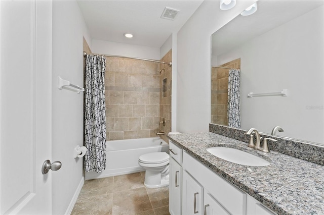 13233 Canopy Creek Dr, Tampa, FL 33625 - bathroom featuring toilet, tile patterned flooring, vanity, shower / bath combo, and baseboards