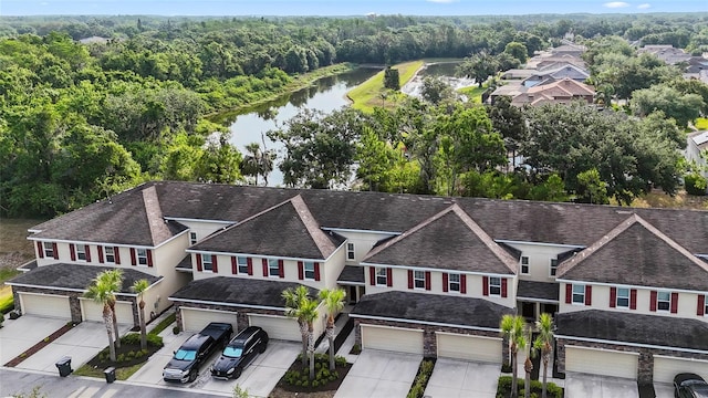 13233 Canopy Creek Dr, Tampa, FL 33625 - aerial view of a nearby body of water and a heavily wooded area
