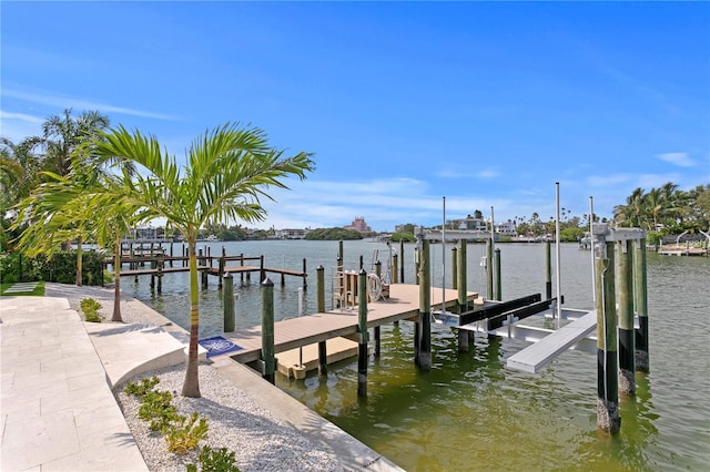 243 Hermosita Dr, St Pete Beach, FL 33706 - dock area with boat lift and a water view