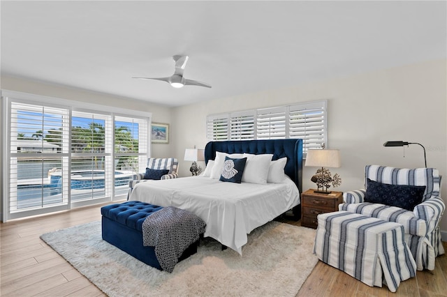 243 Hermosita Dr, St Pete Beach, FL 33706 - bedroom with wood finished floors and ceiling fan