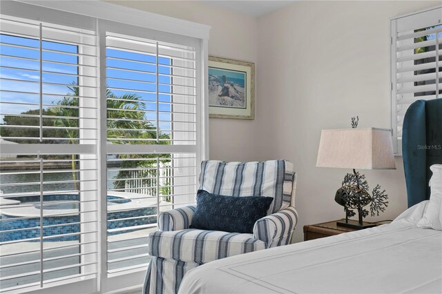 243 Hermosita Dr, St Pete Beach, FL 33706 - bedroom featuring multiple windows
