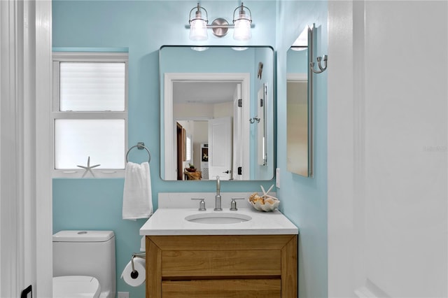 243 Hermosita Dr, St Pete Beach, FL 33706 - bathroom with toilet and vanity
