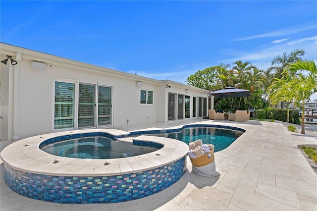 243 Hermosita Dr, St Pete Beach, FL 33706 - view of pool featuring a patio area and a pool with connected hot tub