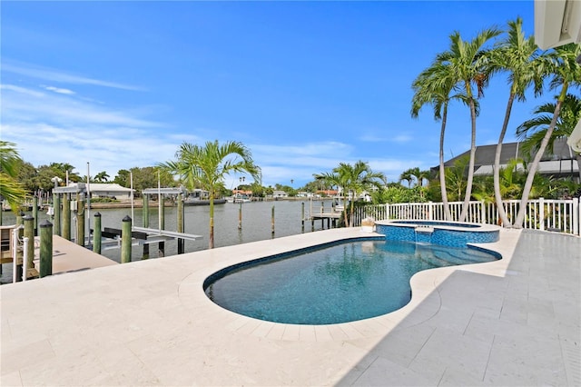 243 Hermosita Dr, St Pete Beach, FL 33706 - view of swimming pool featuring boat lift, a dock, a water view, and a pool with connected hot tub
