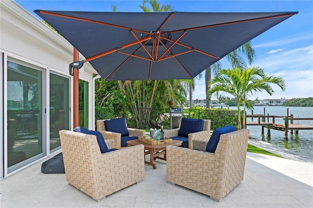 243 Hermosita Dr, St Pete Beach, FL 33706 - view of patio / terrace featuring a water view, an outdoor hangout area, a boat dock, and a grill