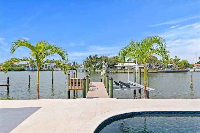 243 Hermosita Dr, St Pete Beach, FL 33706 - dock area with boat lift and a water view