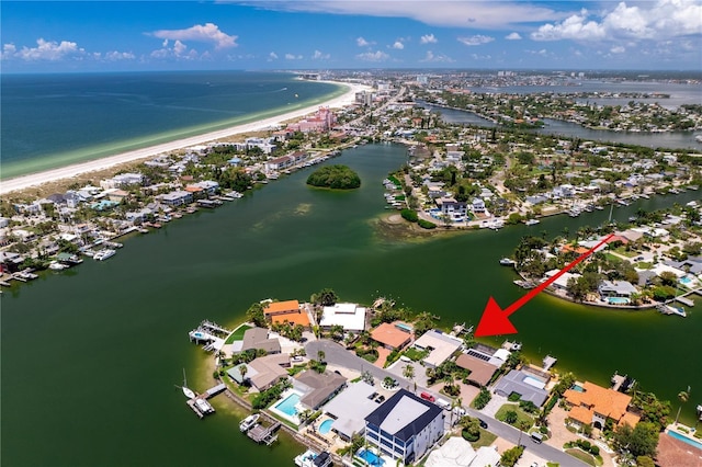 243 Hermosita Dr, St Pete Beach, FL 33706 - aerial view of property and surrounding area with a large body of water and nearby suburban area