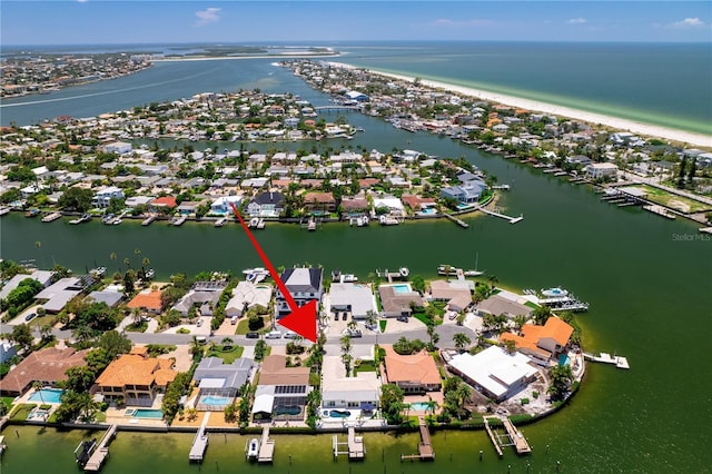 243 Hermosita Dr, St Pete Beach, FL 33706 - aerial view of property's location with a large body of water and nearby suburban area