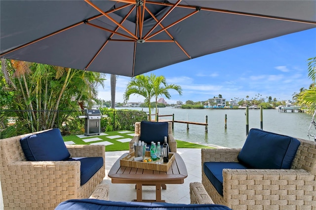 243 Hermosita Dr, St Pete Beach, FL 33706 - view of patio / terrace featuring a water view, area for grilling, a boat dock, and an outdoor hangout area