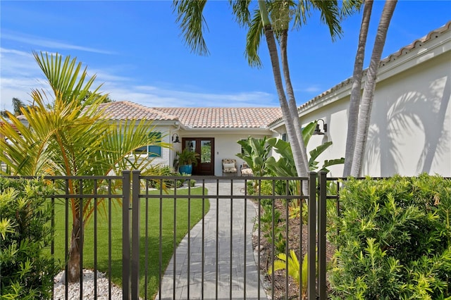 243 Hermosita Dr, St Pete Beach, FL 33706 - gate with french doors