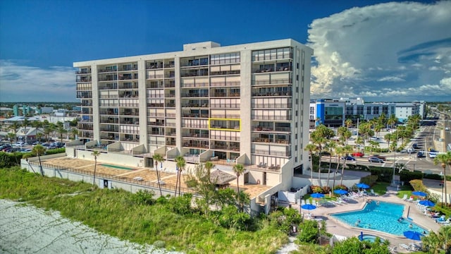 15000 Gulf Blvd Unit 602, Madeira Beach, FL 33708 - view of apartment building / complex featuring a community pool and a city view