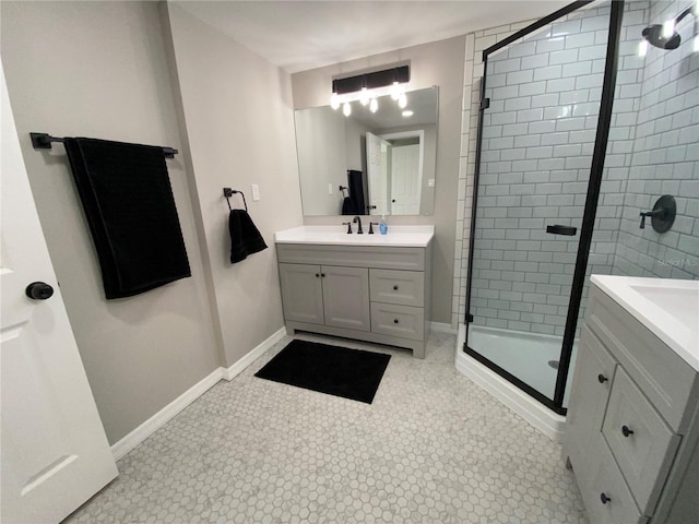 12907 College Hill Dr, Hudson, FL 34667 - full bath with vanity, a stall shower, baseboards, and tile patterned floors
