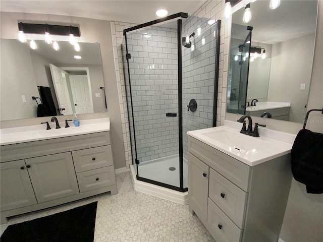 12907 College Hill Dr, Hudson, FL 34667 - full bath featuring a stall shower and two vanities