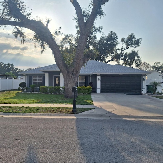37535 Laurel Hammock Dr, Zephyrhills, FL 33541 - single story home featuring concrete driveway and an attached garage