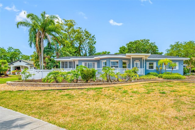 401 Whitcomb Blvd, Tarpon Springs, FL 34689 - ranch-style home with a porch