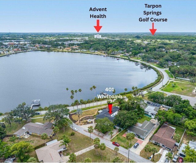 401 Whitcomb Blvd, Tarpon Springs, FL 34689 - aerial overview of property's location featuring a large body of water