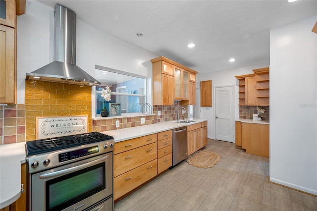 401 Whitcomb Blvd, Tarpon Springs, FL 34689 - kitchen featuring stainless steel appliances, wall chimney range hood, tasteful backsplash, open shelves, and a sink